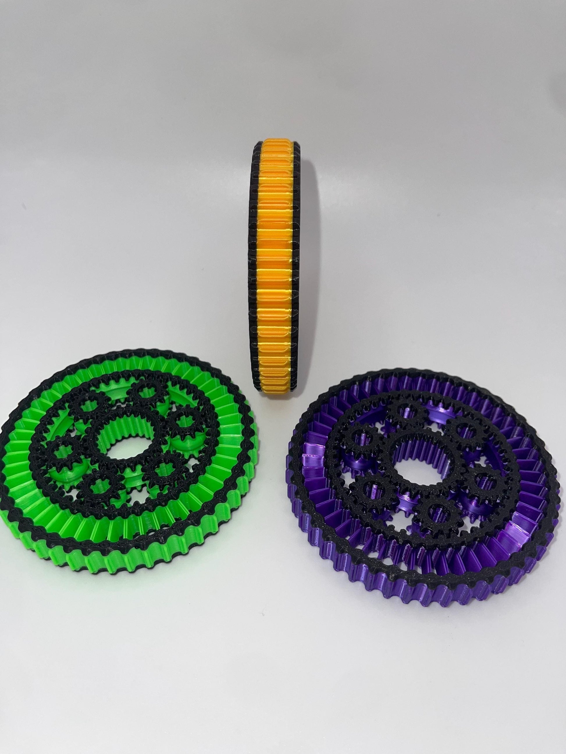 Planetary Gear Fidget Spinner | Mechanical Desk Toy | Stress Relief Fidget for Focus & Relaxation featuring colorful gears.